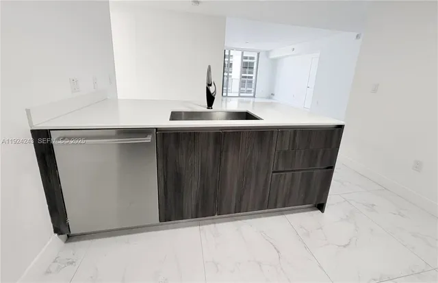 a lobby with furniture and garden