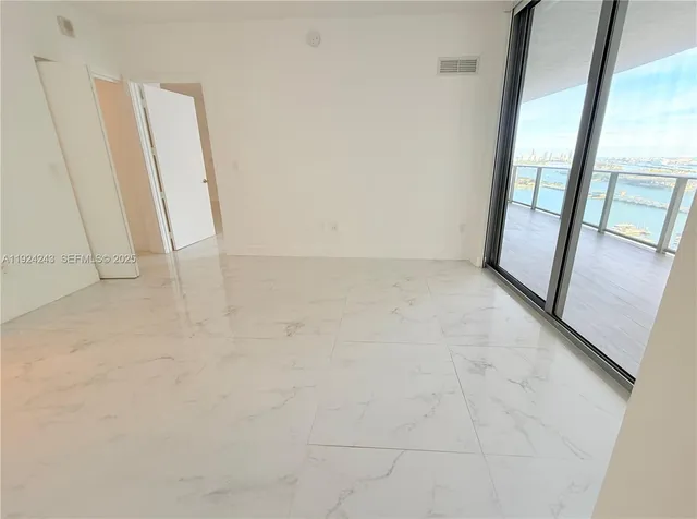 a view of a swimming pool with a lake view