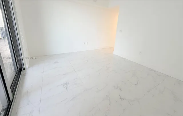 a terrace with outdoor seating and city view