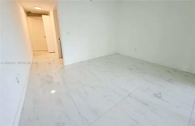 an aerial view of a houses with outdoor space