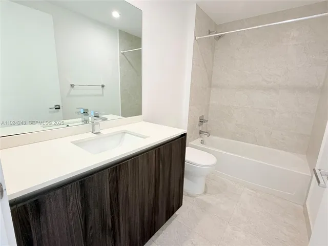 a view of a entryway with furniture and carpet