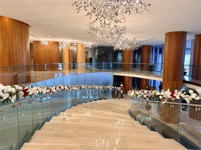 a room with gym equipment and a large window