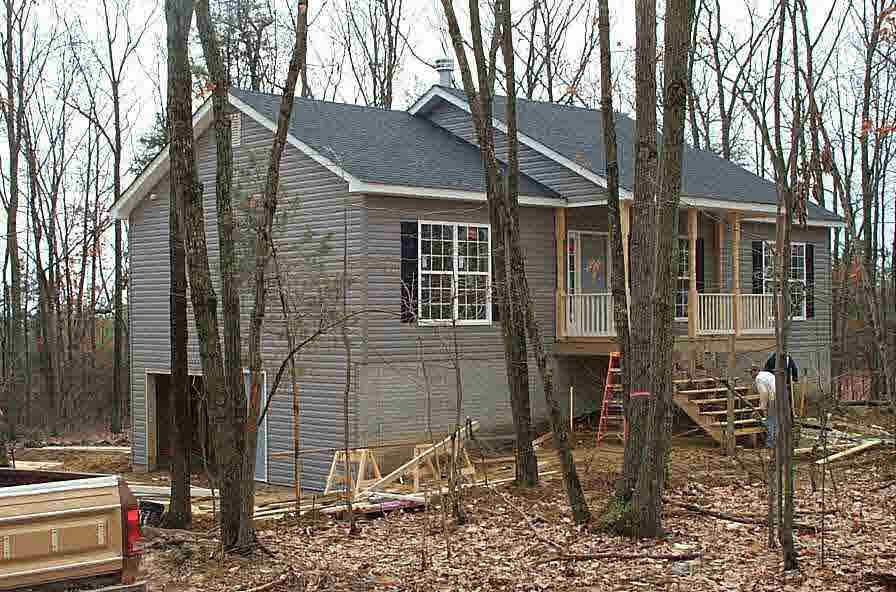 Brickhouse Road Louisa, VA 23093 - Photo 1 of 4 a view of a house with a yard and wooden fence