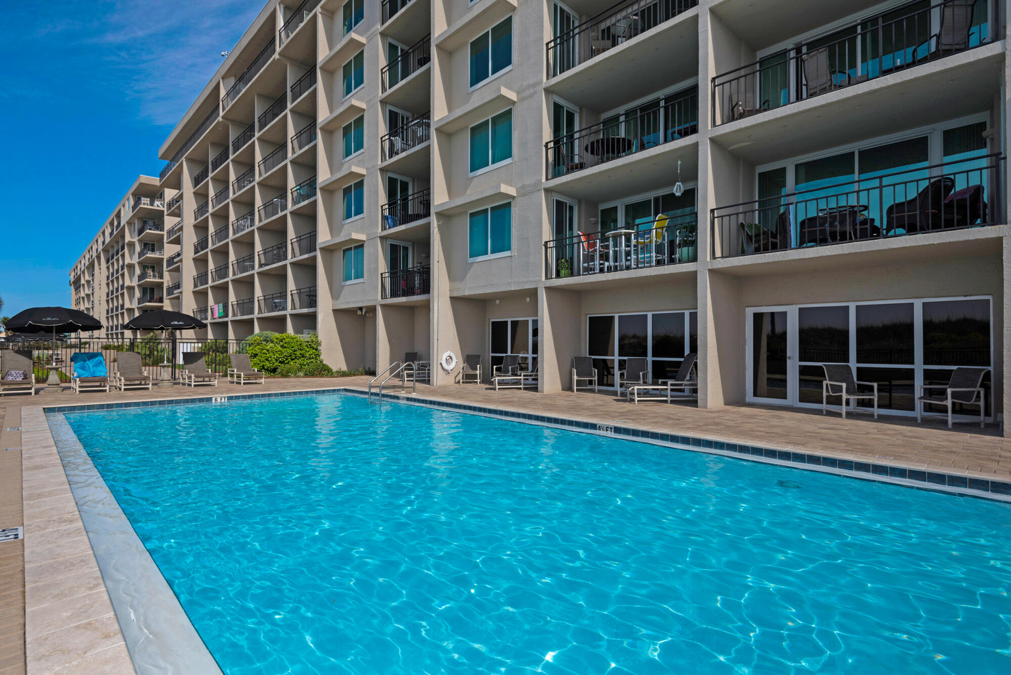 381 Santa Rosa Boulevard, Unit C611 Fort Walton Beach, FL 32548 - Photo 7 of 12 a view of building with windows
