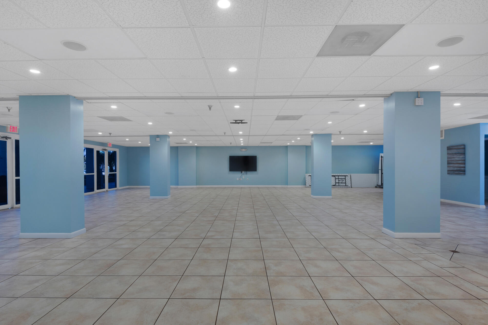381 Santa Rosa Boulevard, Unit C611 Fort Walton Beach, FL 32548 - Photo 10 of 12 a big room with windows and a chandelier