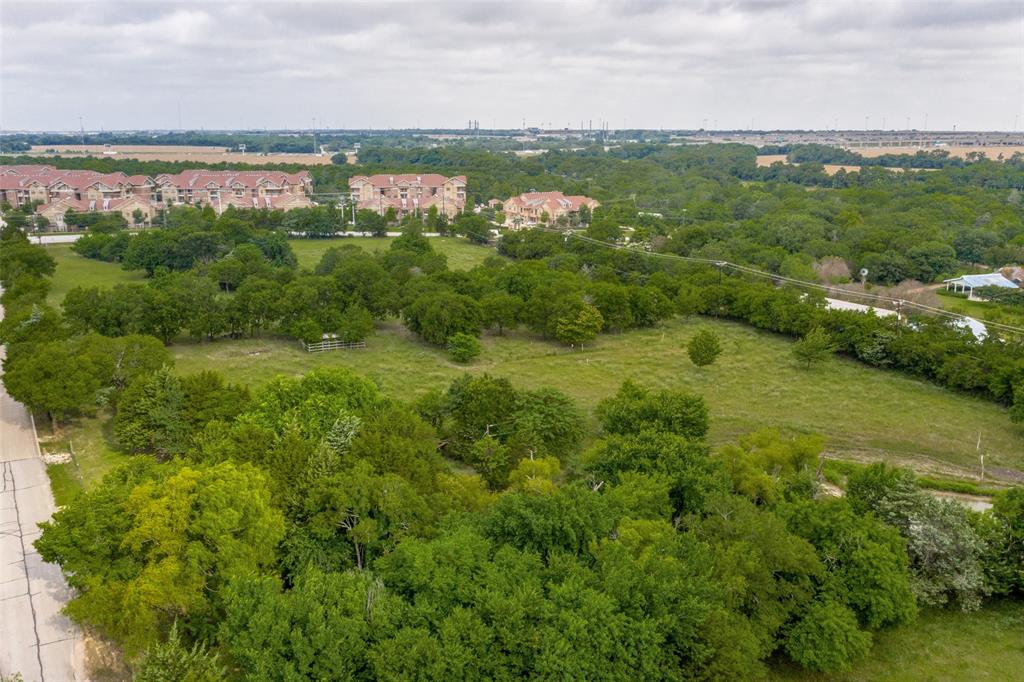 650 South State Highway 5 Fairview, TX 75069 - Photo 2 of 5 a view of a green field with an ocean view