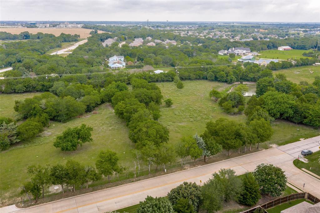 650 South State Highway 5 Fairview, TX 75069 - Photo 4 of 5 an aerial view of lake residential houses with outdoor space and trees