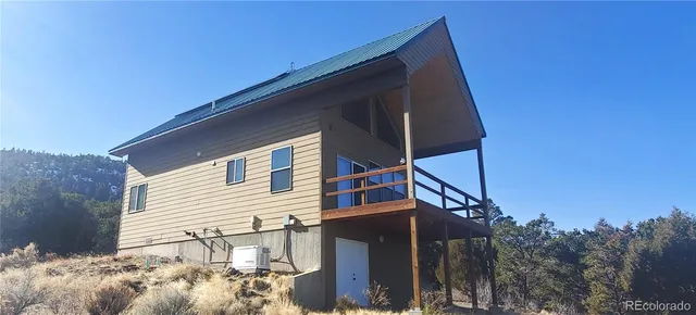 a view of a house with a snow