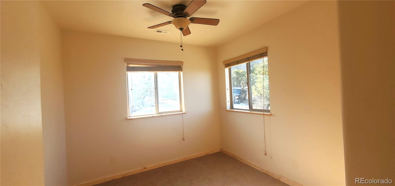 4984 Edmond Road Fort Garland, CO 81133 - Photo 17 of 24 an empty room with windows