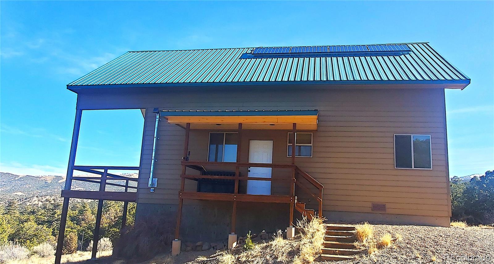 4984 Edmond Road Fort Garland, CO 81133 - Photo 2 of 24 a front view of a house