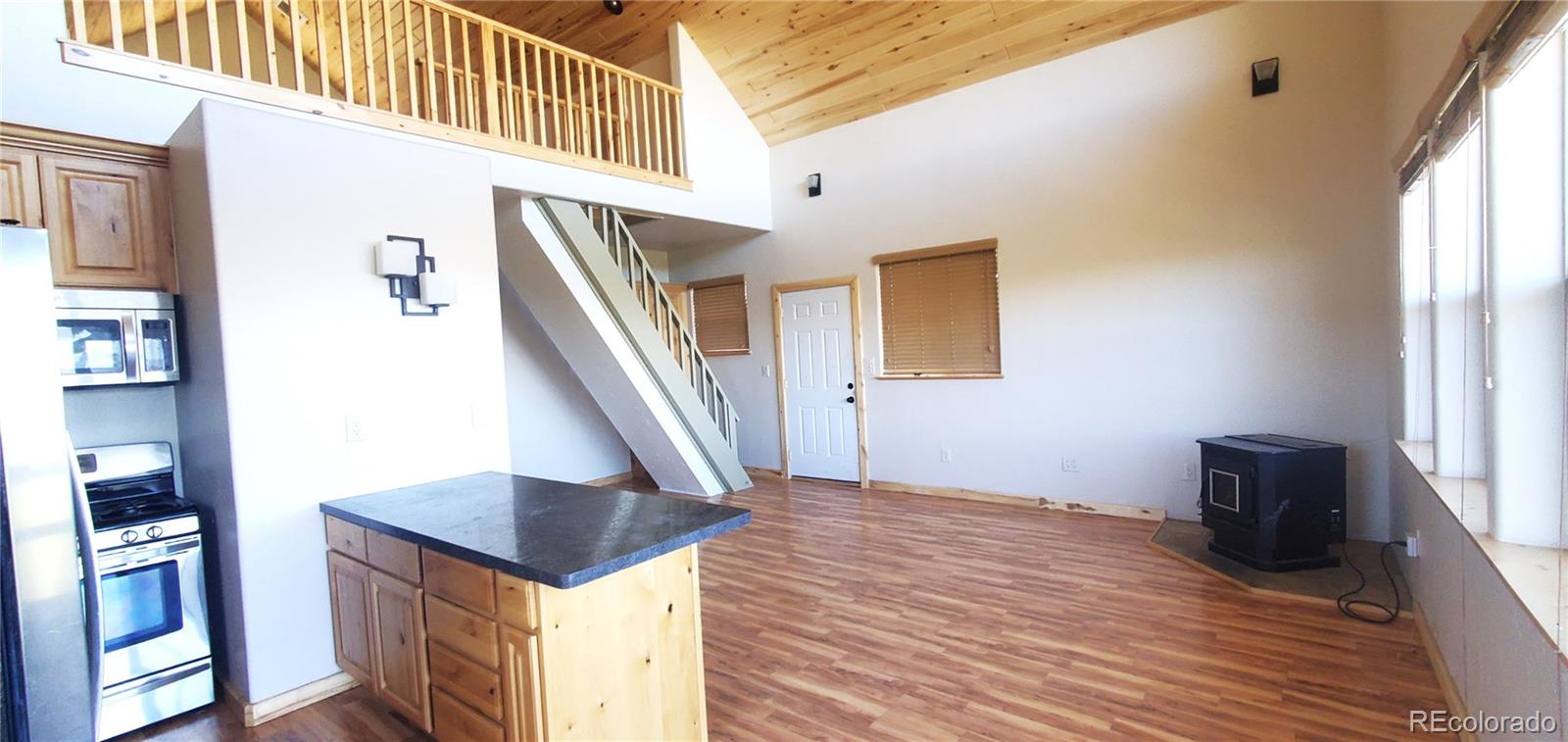 4984 Edmond Road Fort Garland, CO 81133 - Photo 6 of 24 a view of entryway with furniture and wooden floor