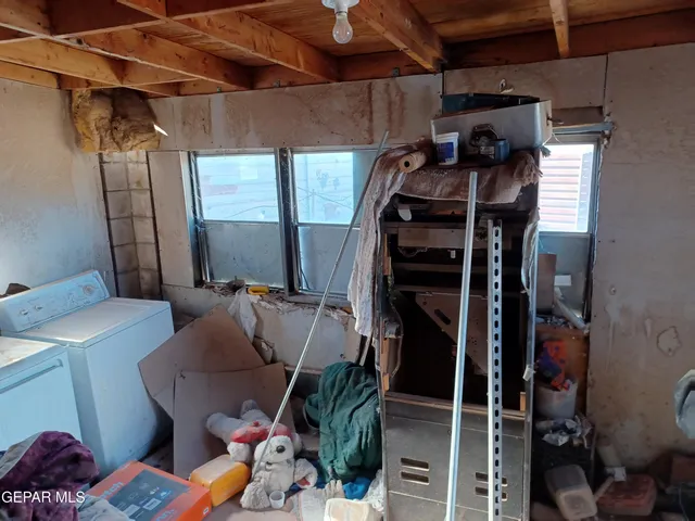 a view of a backyard of the house