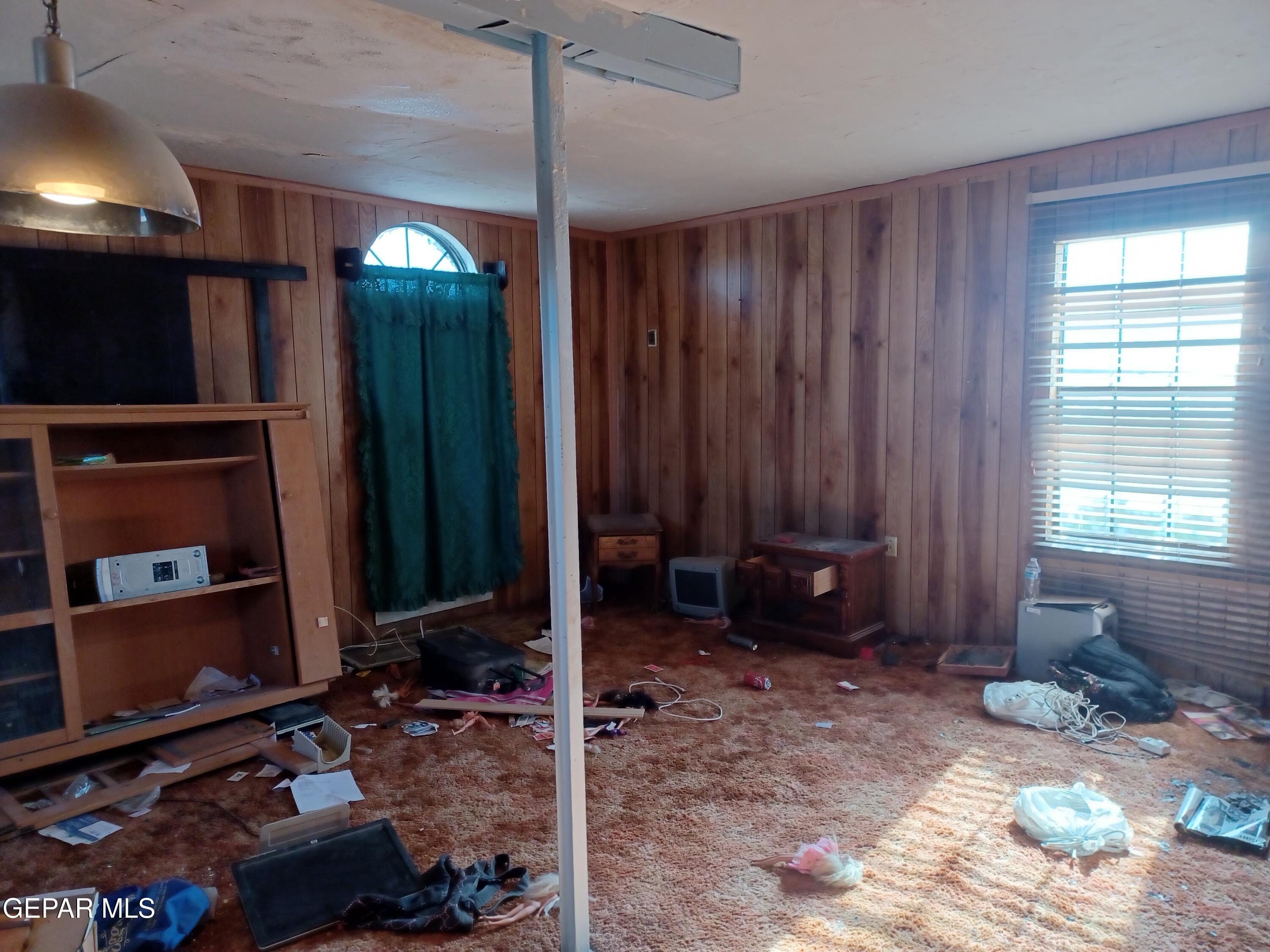 627 Milo Drive El Paso, TX 79927 - Photo 21 of 21 a living room with hard wood floor and a rug