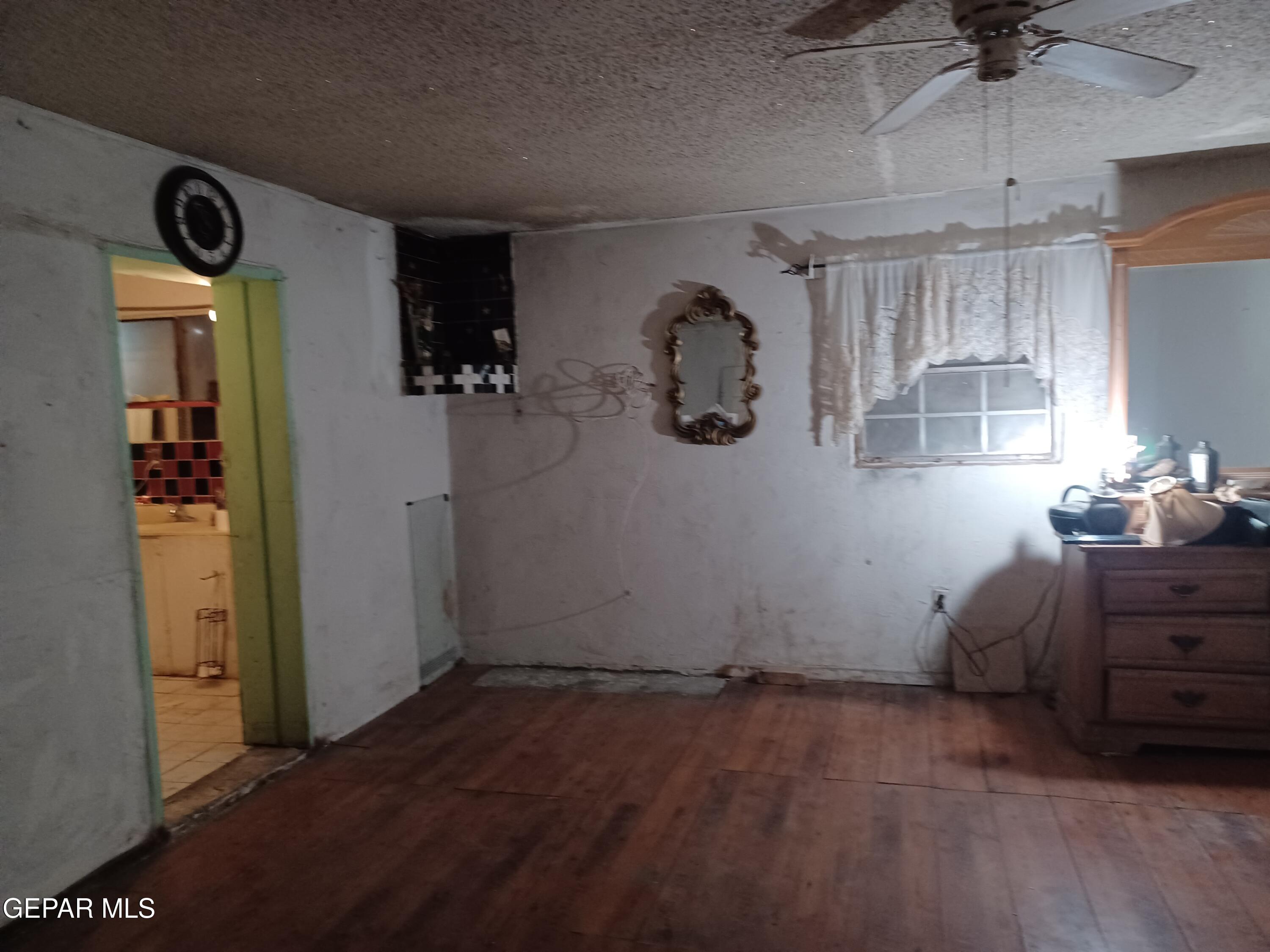 627 Milo Drive El Paso, TX 79927 - Photo 8 of 21 a view of a storage & utility room with a window