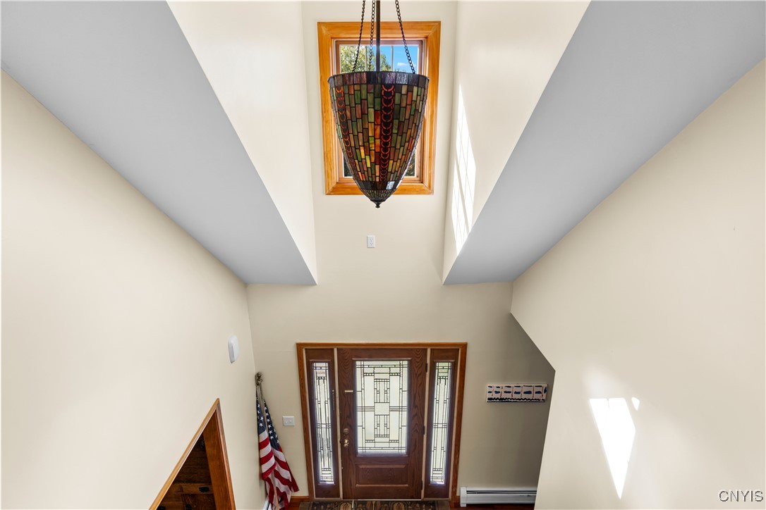 1038 Shackham Road Fabius, NY 13063 - Photo 26 of 47 View of the foyer from the upstairs landing