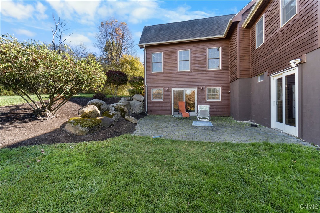 1038 Shackham Road Fabius, NY 13063 - Photo 37 of 47 Patio outside the basement doors