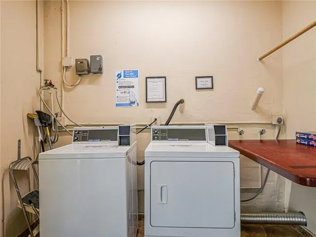 a utility room with dryer and washer