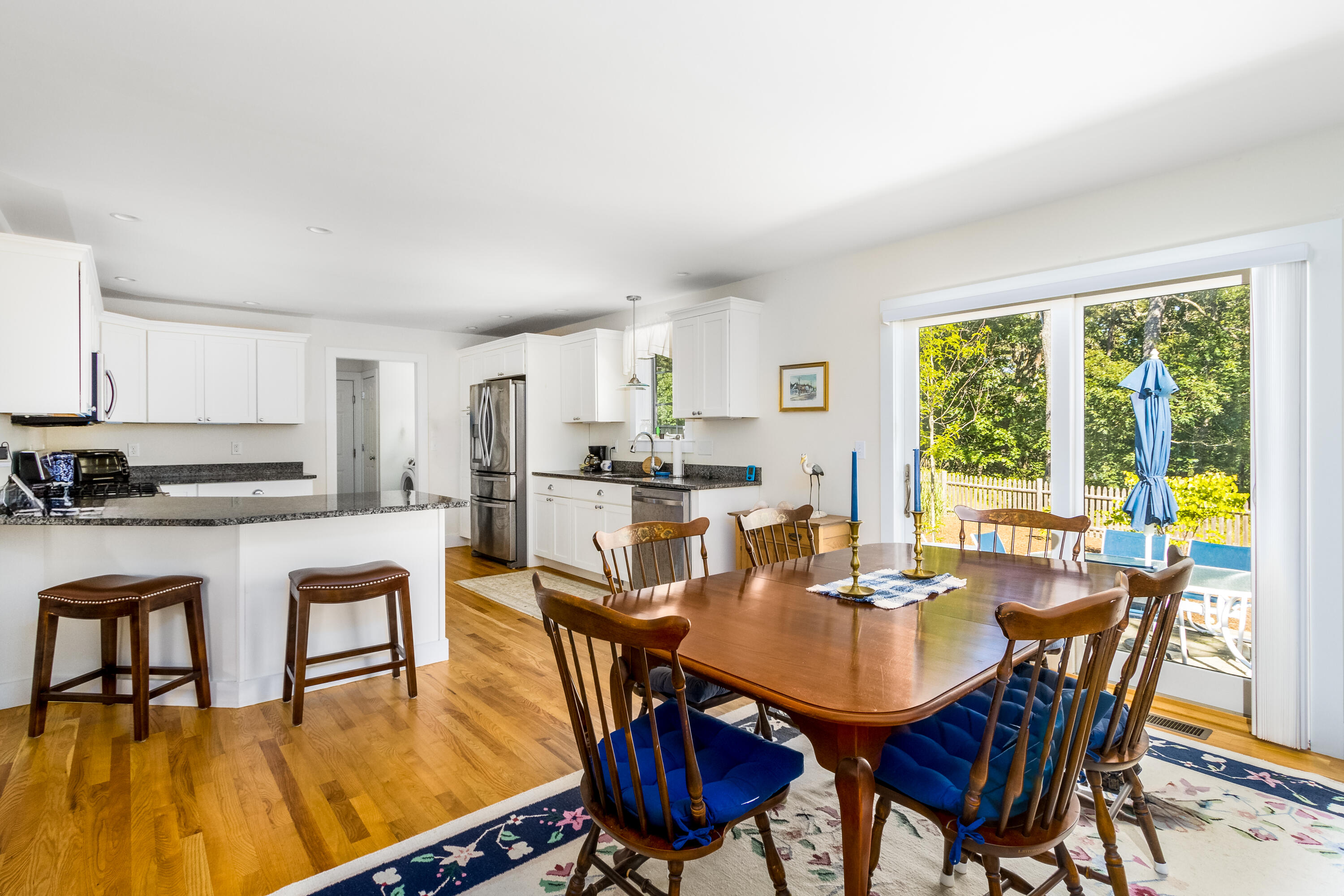 40 Pine Needle Road Wellfleet, MA 02667 - Photo 13 of 36 a view of a dining room with furniture window and wooden floor