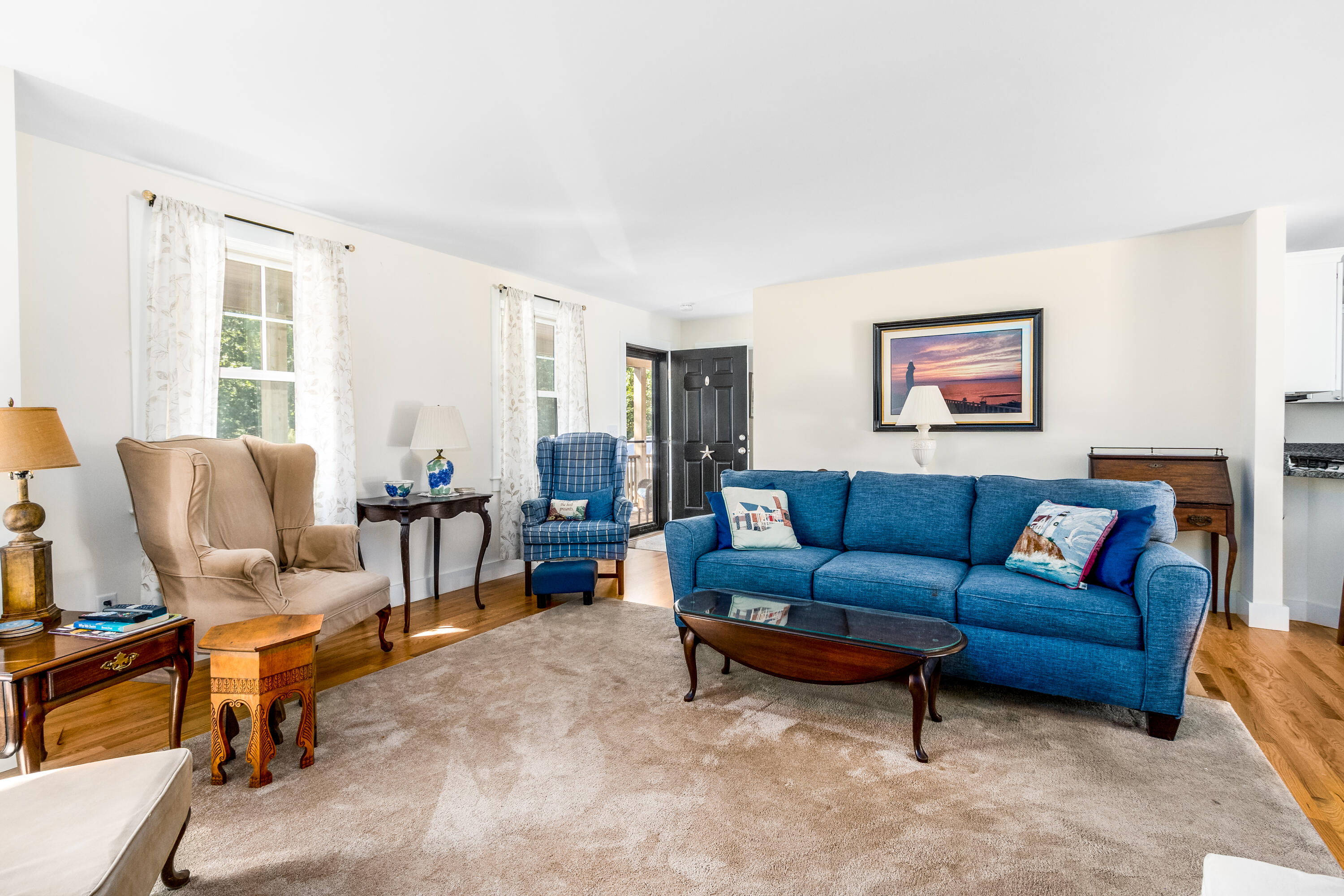 40 Pine Needle Road Wellfleet, MA 02667 - Photo 19 of 36 a living room with furniture and a large window