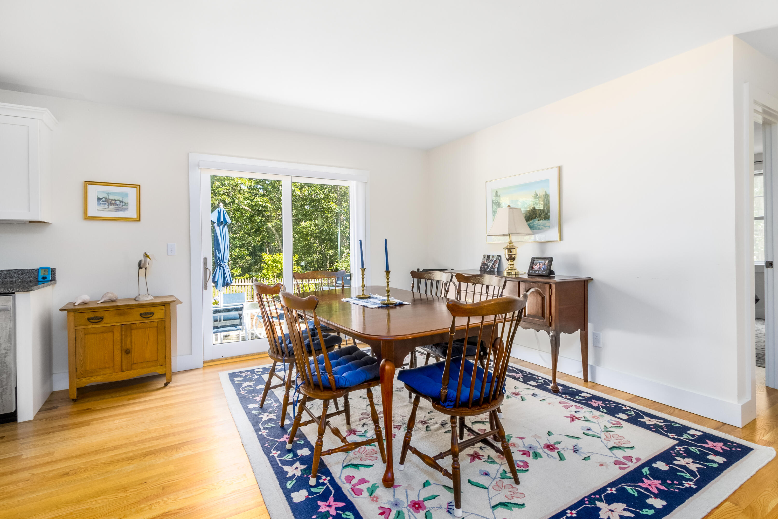 40 Pine Needle Road Wellfleet, MA 02667 - Photo 21 of 36 a view of a dining room with furniture window and wooden floor
