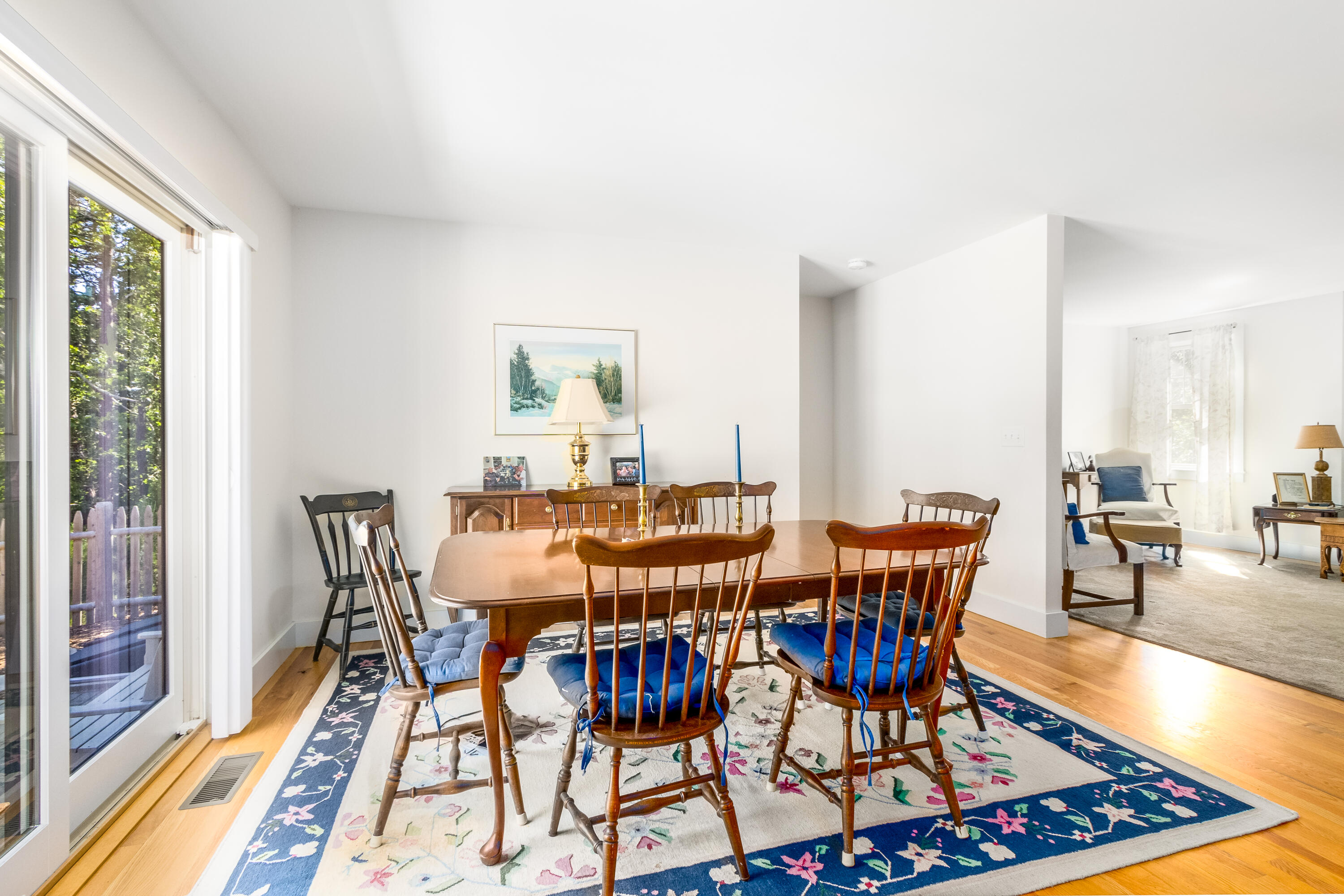 40 Pine Needle Road Wellfleet, MA 02667 - Photo 22 of 36 a view of a dining room with furniture and wooden floor