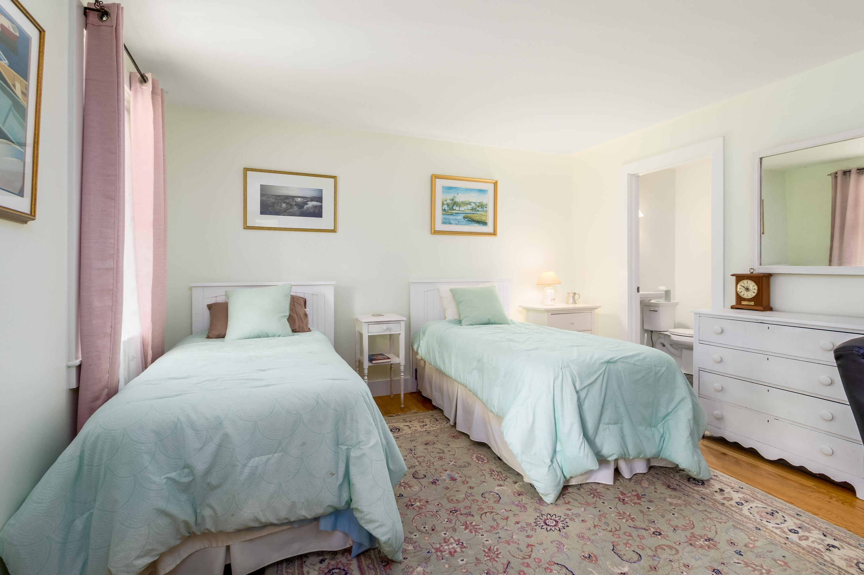 40 Pine Needle Road Wellfleet, MA 02667 - Photo 23 of 36 a bedroom with two beds and painting on the wall