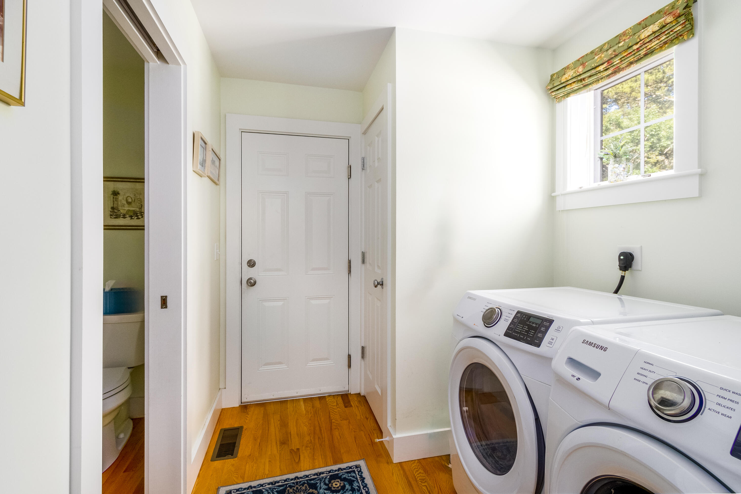 40 Pine Needle Road Wellfleet, MA 02667 - Photo 28 of 36 a view of storage and utility room with washer and dryer