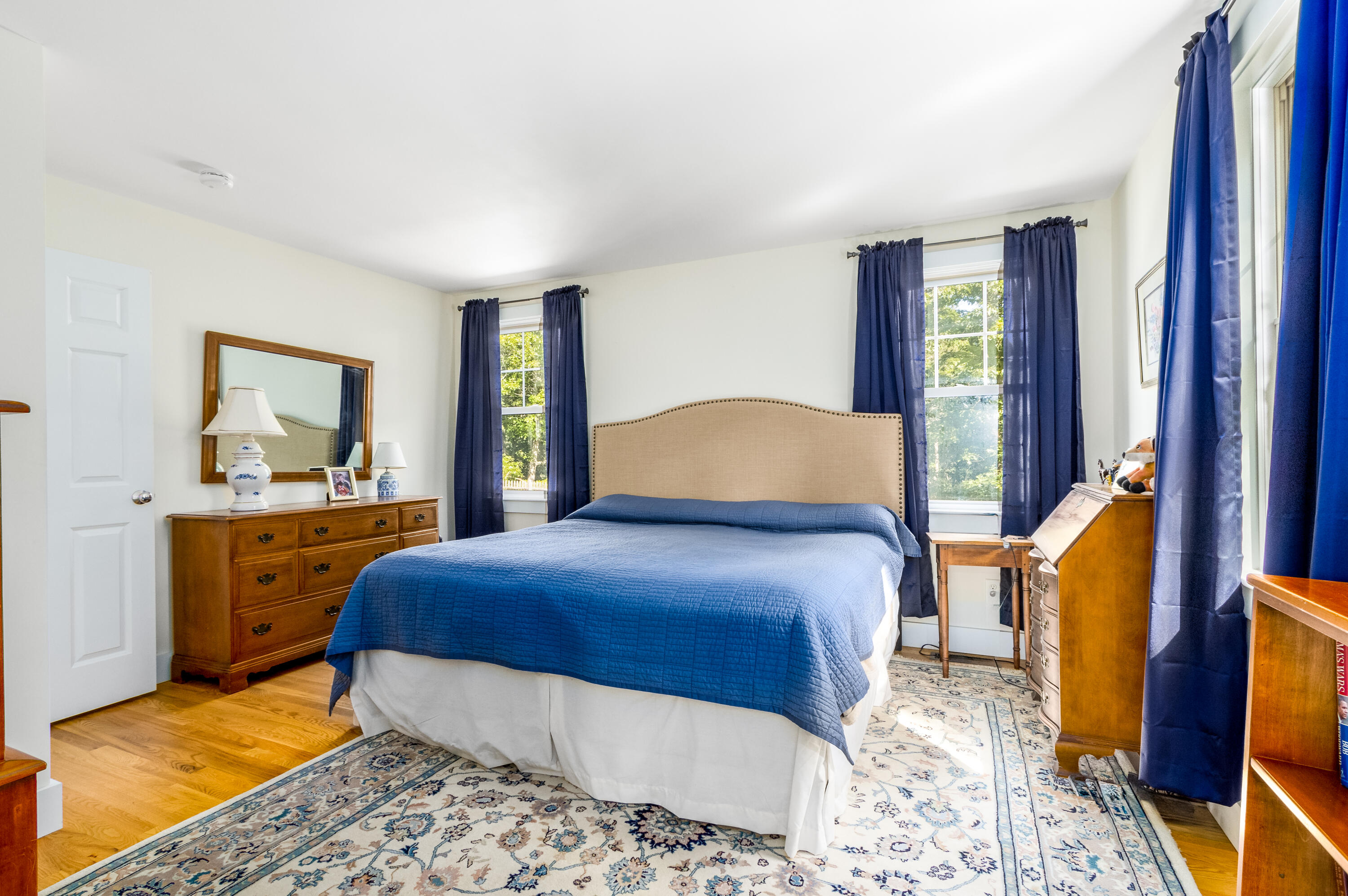 40 Pine Needle Road Wellfleet, MA 02667 - Photo 31 of 36 a bedroom with a large bed and a dresser