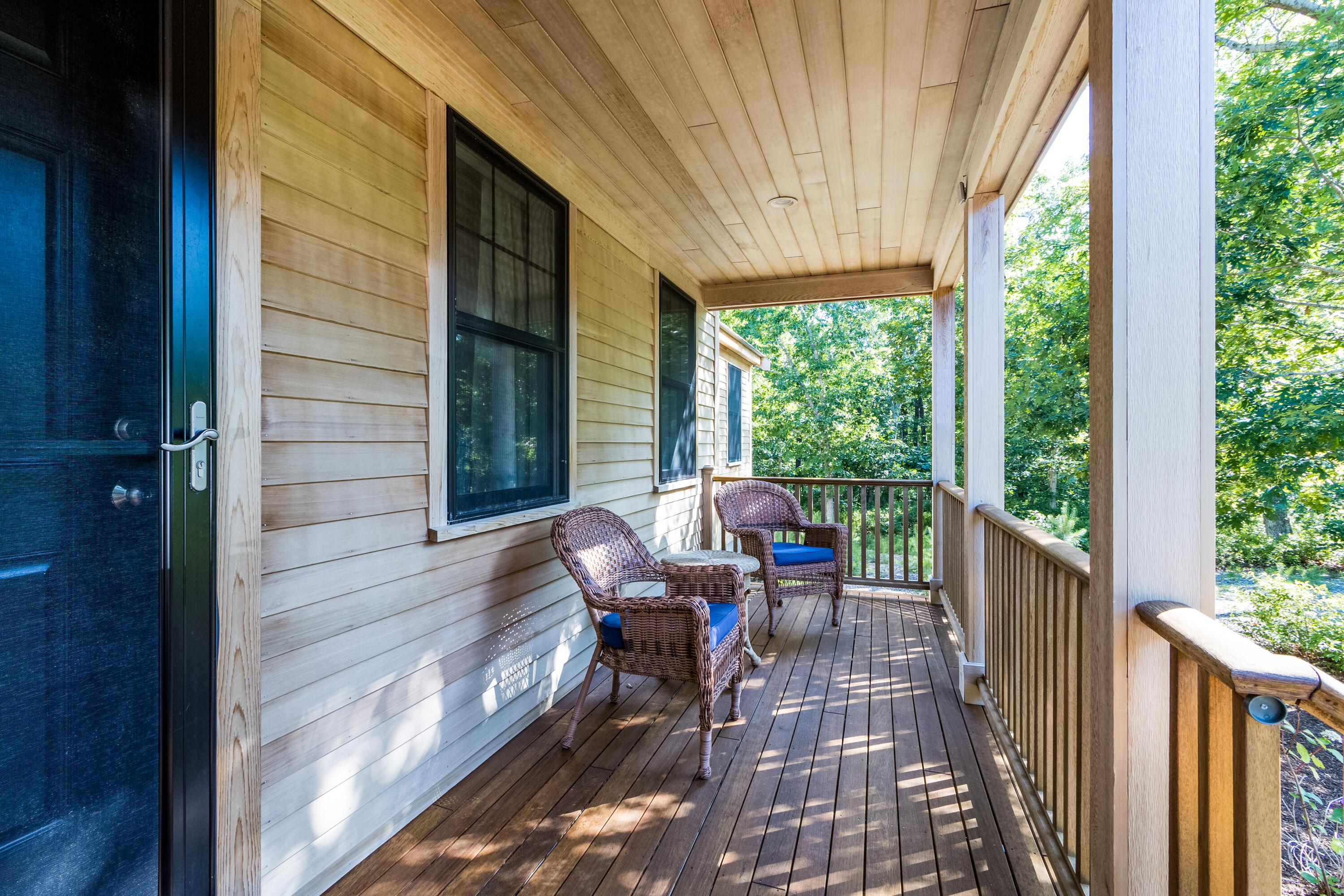 40 Pine Needle Road Wellfleet, MA 02667 - Photo 35 of 36 a view of a two chairs in the balcony
