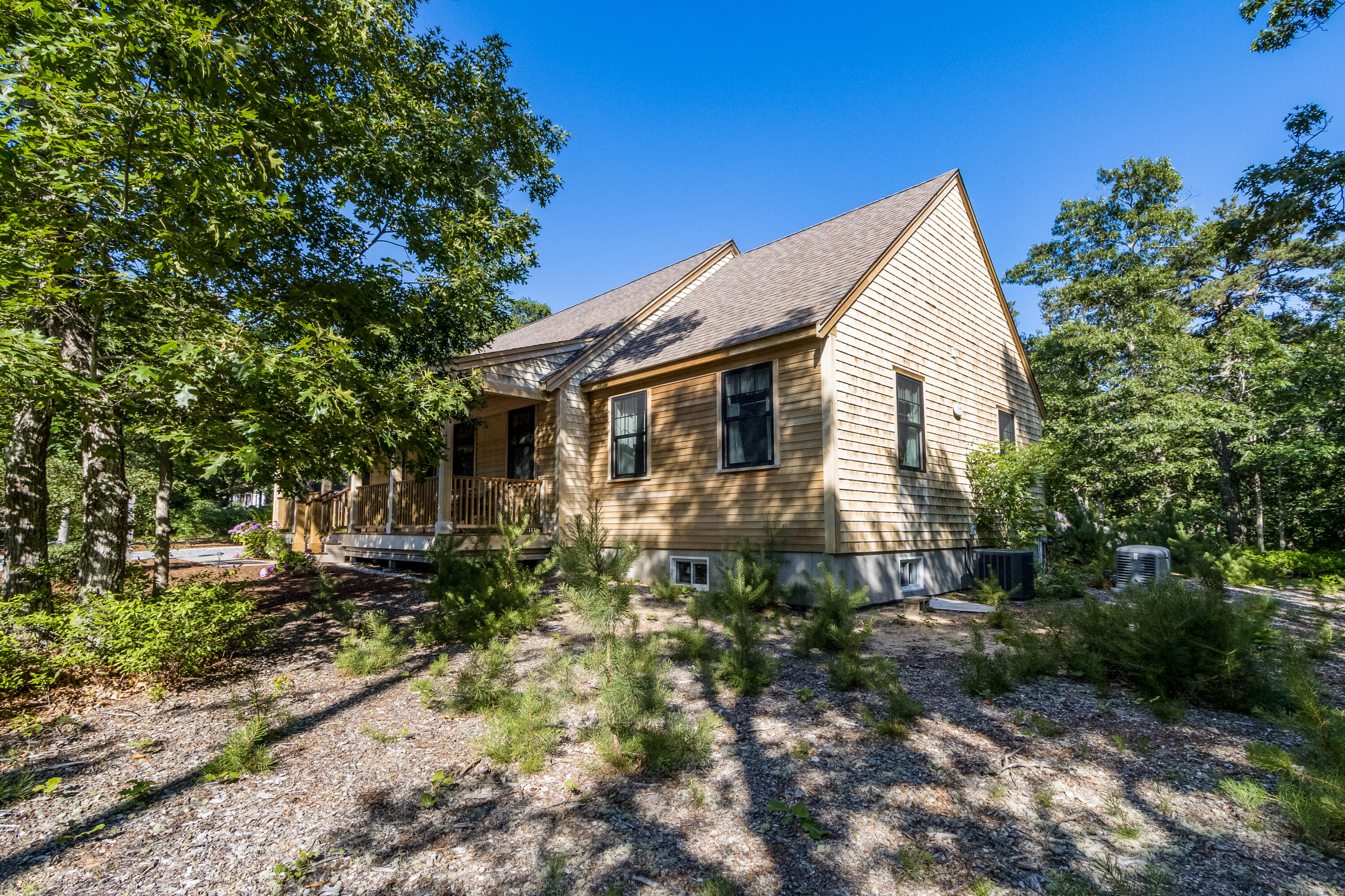 40 Pine Needle Road Wellfleet, MA 02667 - Photo 36 of 36 a view of a house with a yard
