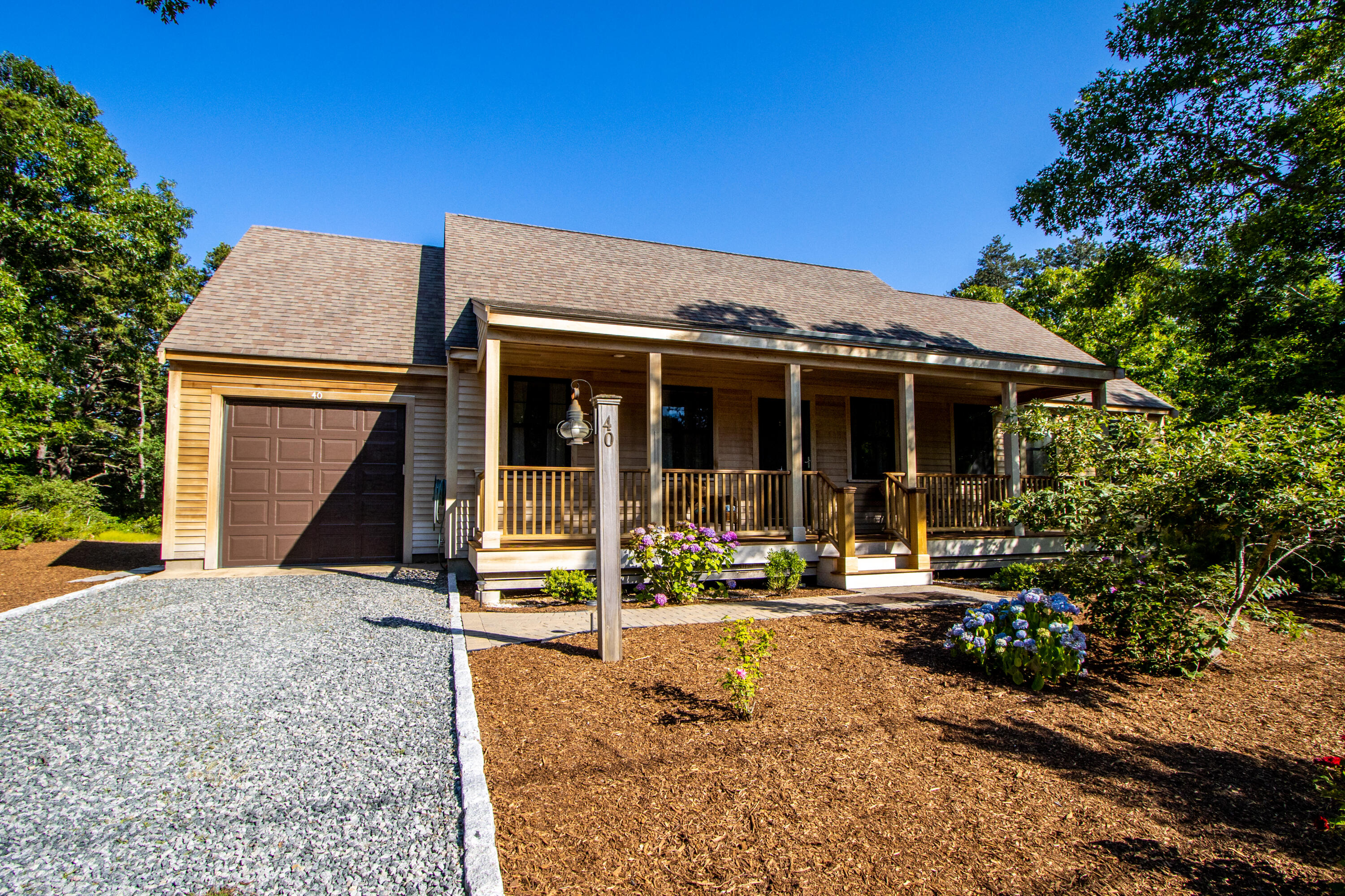 40 Pine Needle Road Wellfleet, MA 02667 - Photo 5 of 36 front view of a house with a porch