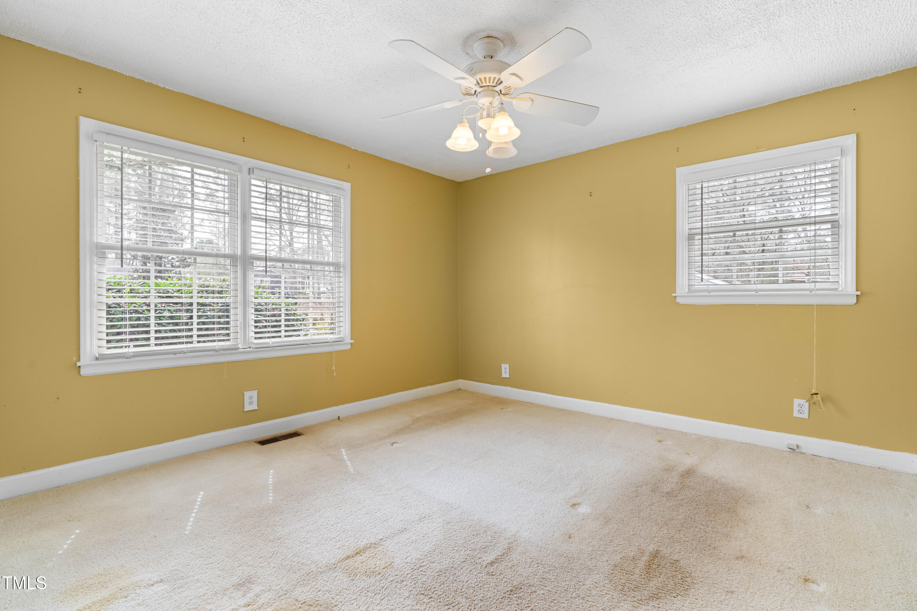 3617 Cranston Road Garner, NC 27529 - Photo 16 of 25 a view of an empty room with a window