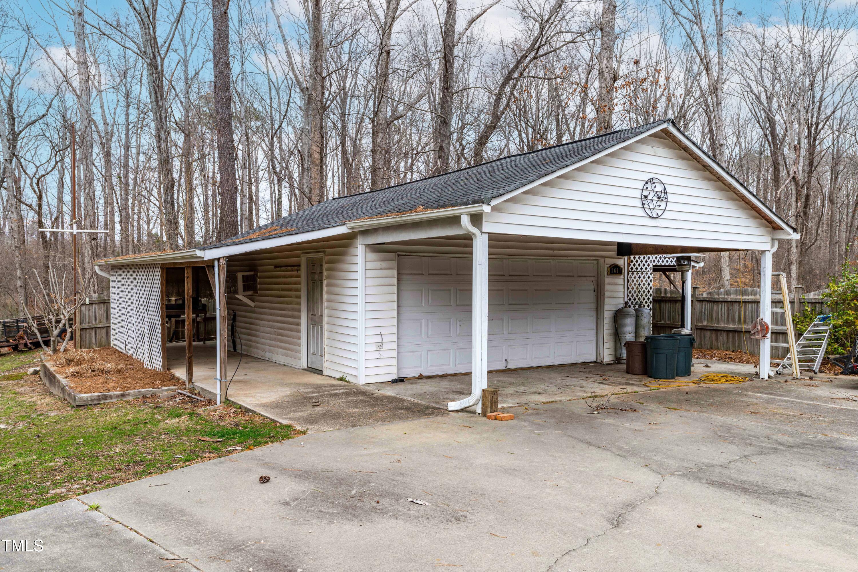 3617 Cranston Road Garner, NC 27529 - Photo 19 of 25 a view of a house with a yard and large tree
