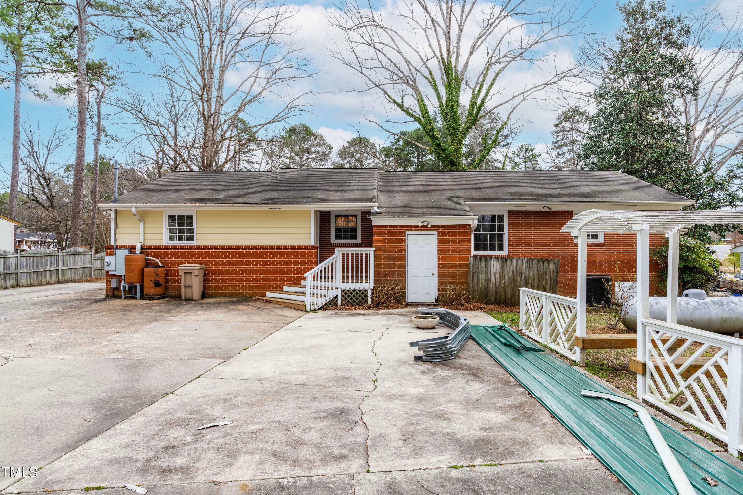 3617 Cranston Road Garner, NC 27529 - Photo 22 of 25 a view of a house with a patio