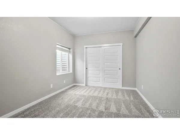 a black and white photo of a living room