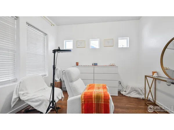 a room with a table and chairs