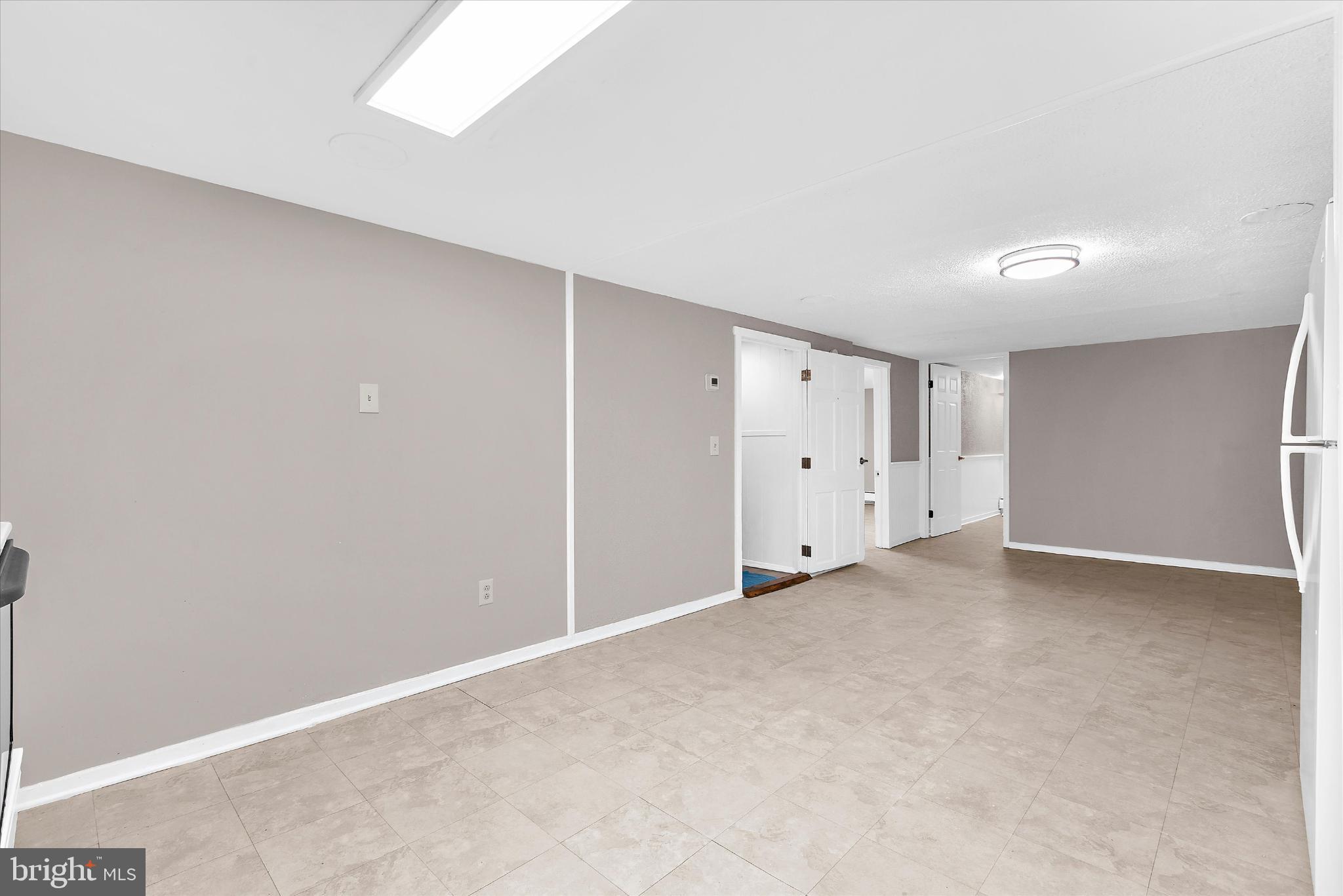 8421 Spring Road Pasadena, MD 21122 - Photo 20 of 30 a view of an empty room