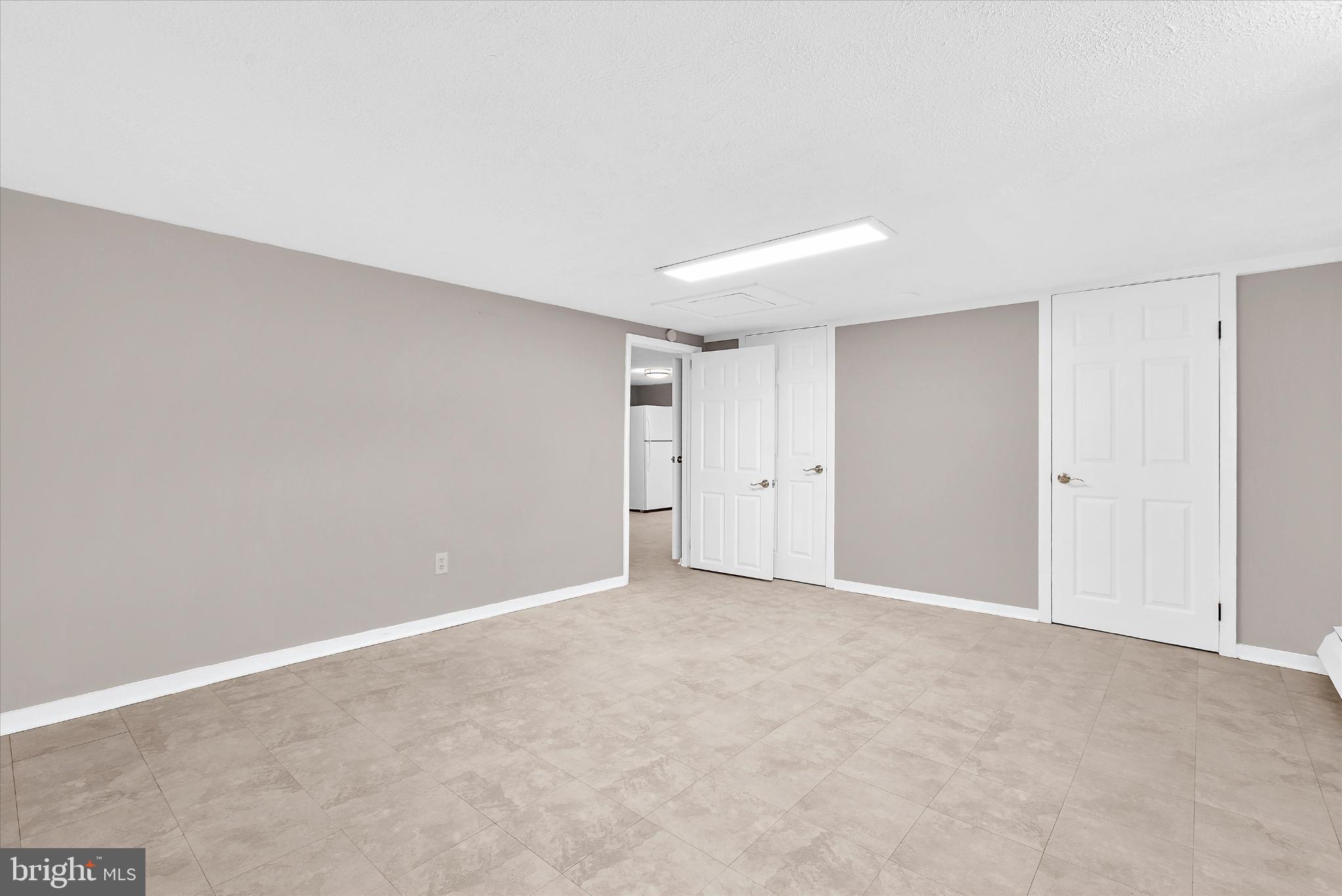 8421 Spring Road Pasadena, MD 21122 - Photo 23 of 32 Lower level bedroom 1