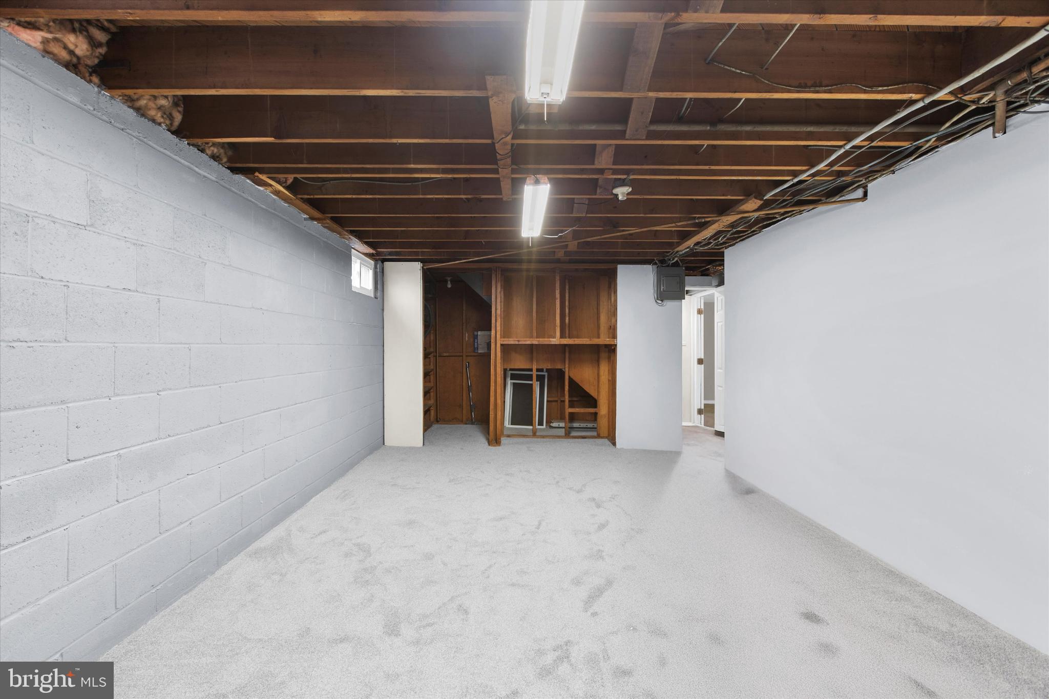 8421 Spring Road Pasadena, MD 21122 - Photo 24 of 30 a view of room with refrigerator and cabinet