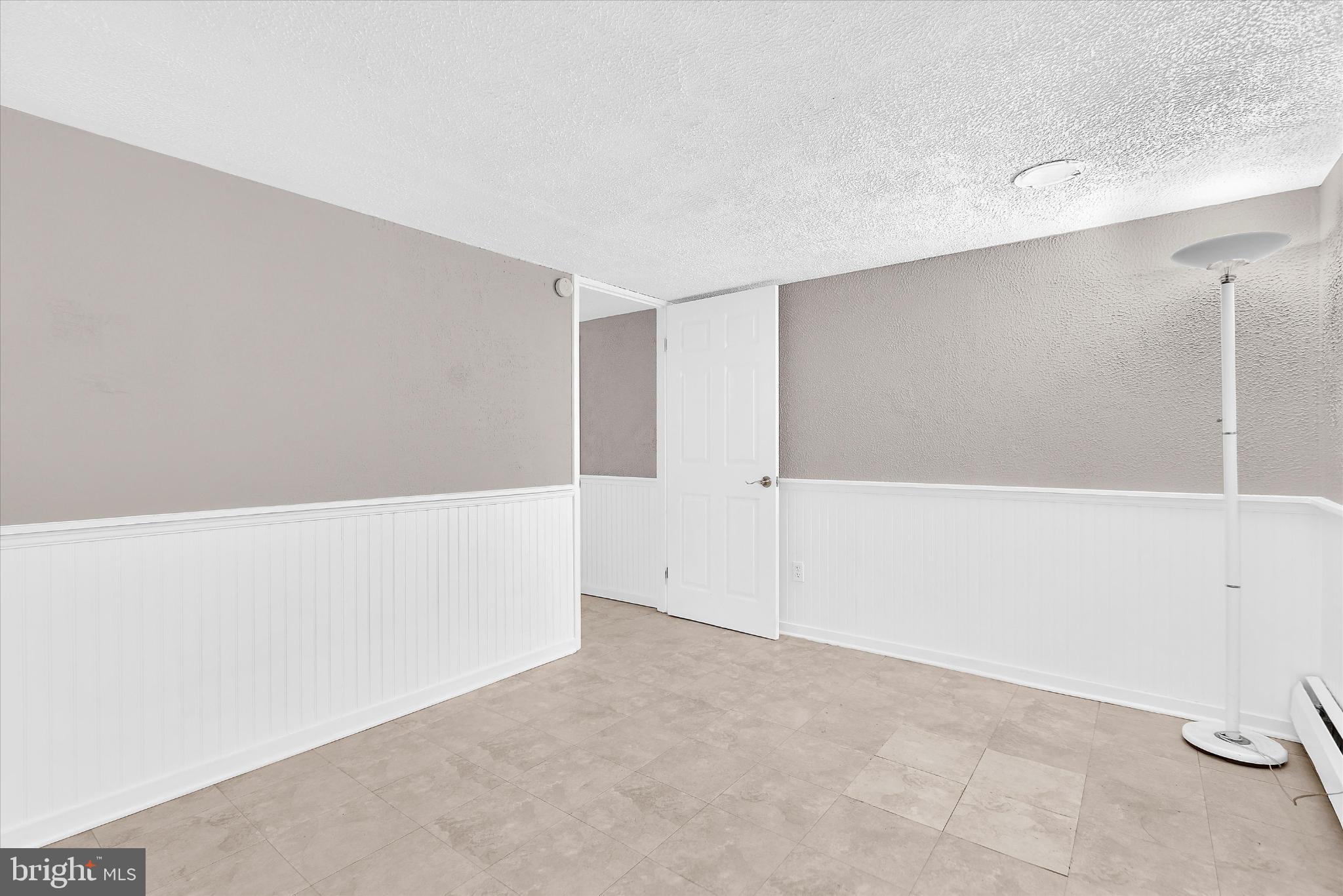 8421 Spring Road Pasadena, MD 21122 - Photo 24 of 32 Lower level bedroom 2