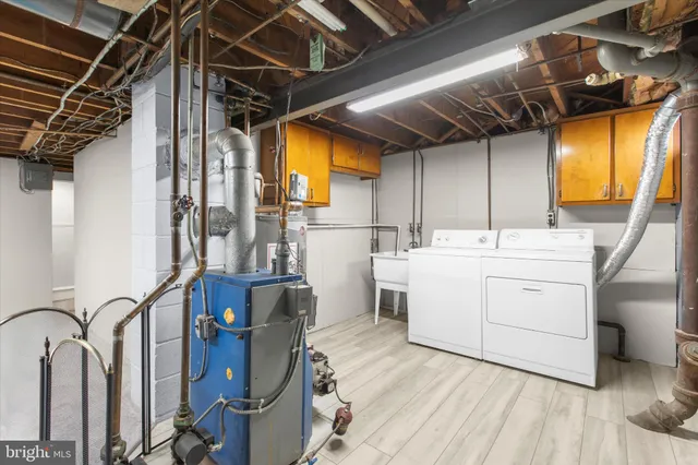 a utility room with cabinets