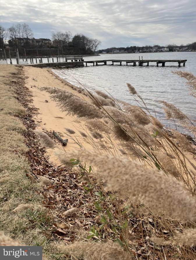 8421 Spring Road Pasadena, MD 21122 - Photo 28 of 30 a view of a lake with houses in the background