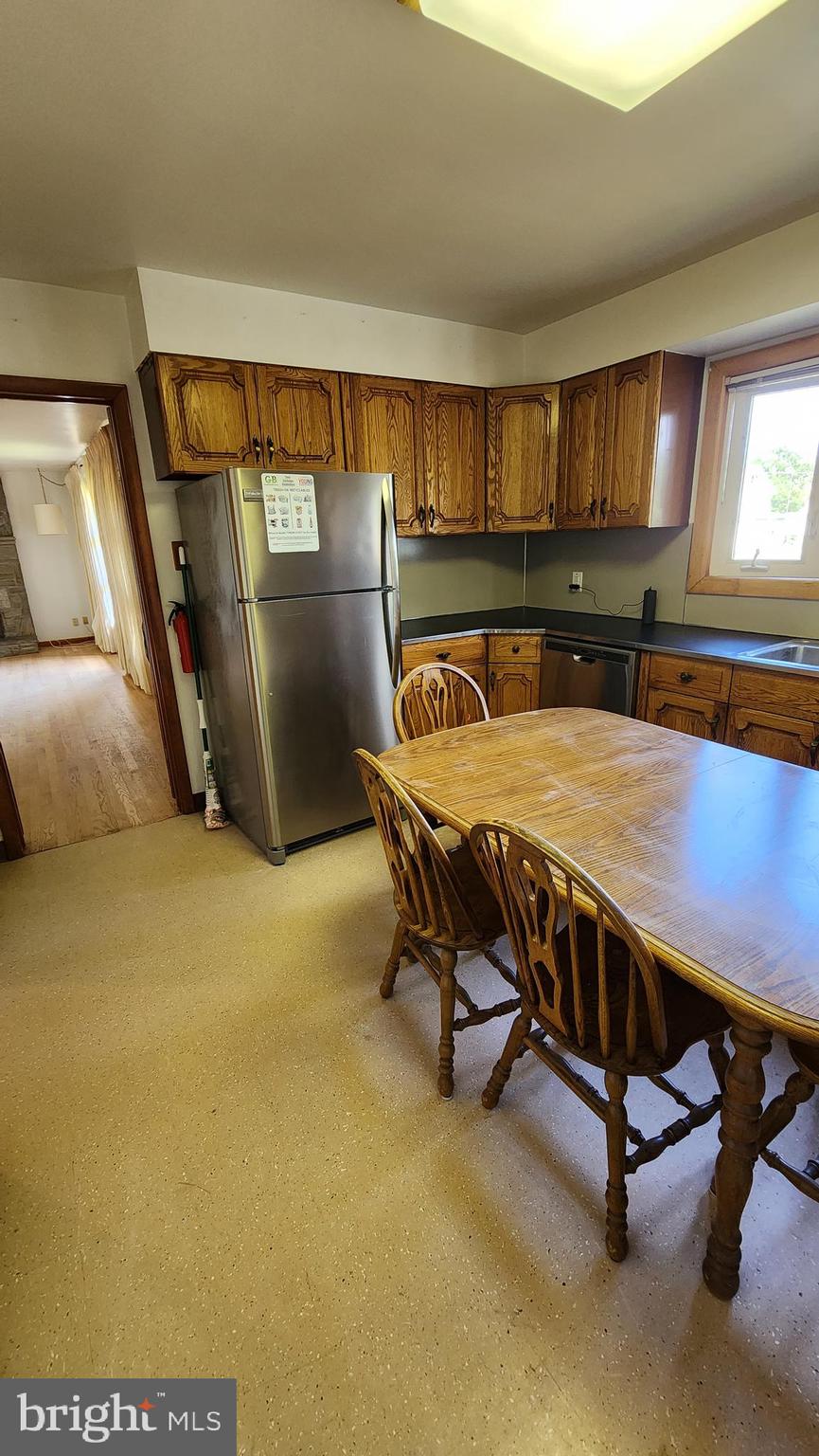 202 Holly Street Glassboro, NJ 08028 - Photo 13 of 14 a dining room with furniture and window