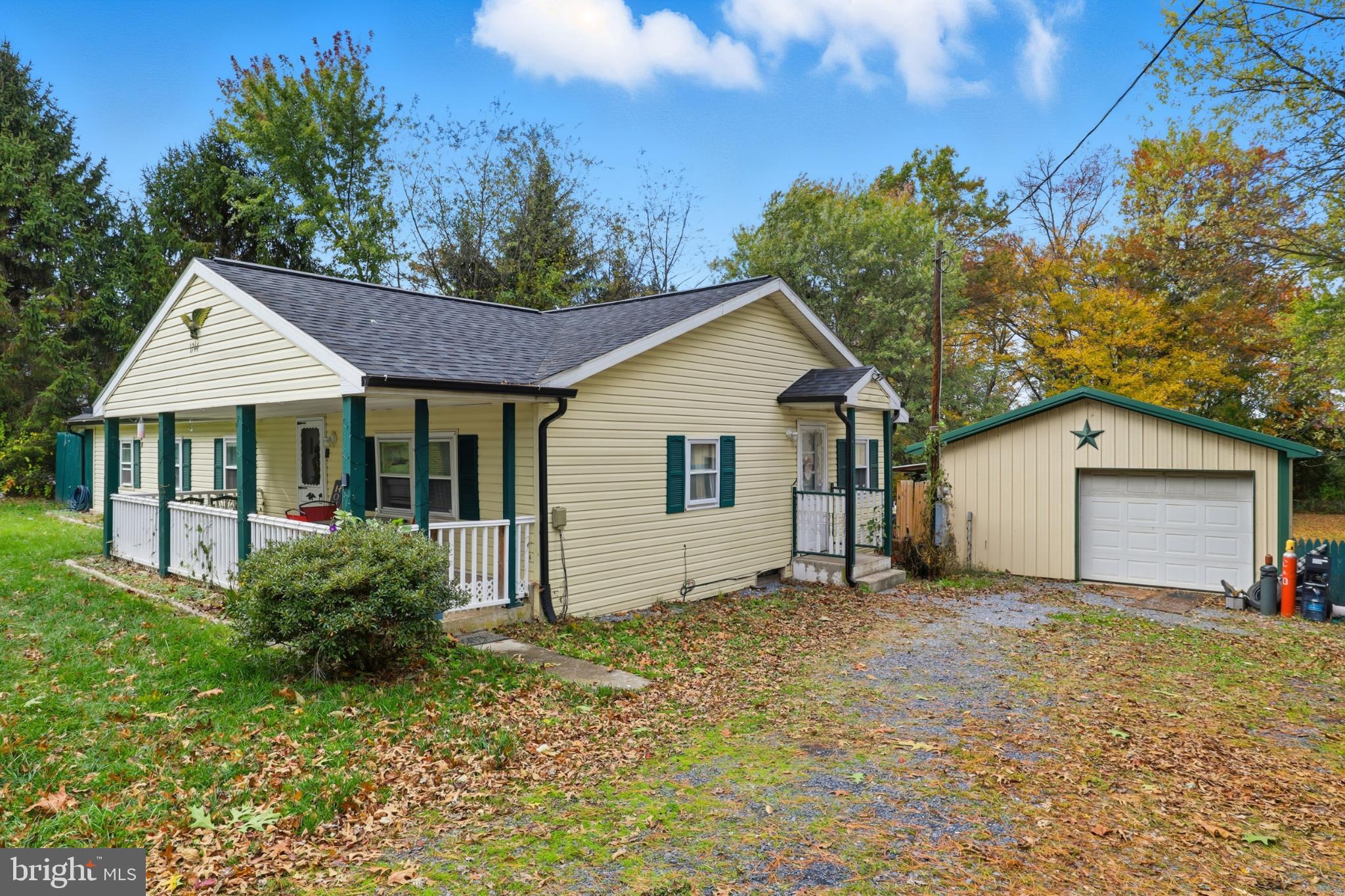 1744 Ridge Road York Springs, PA 17372 - Photo 1 of 30 a view of a house with a yard and large tree