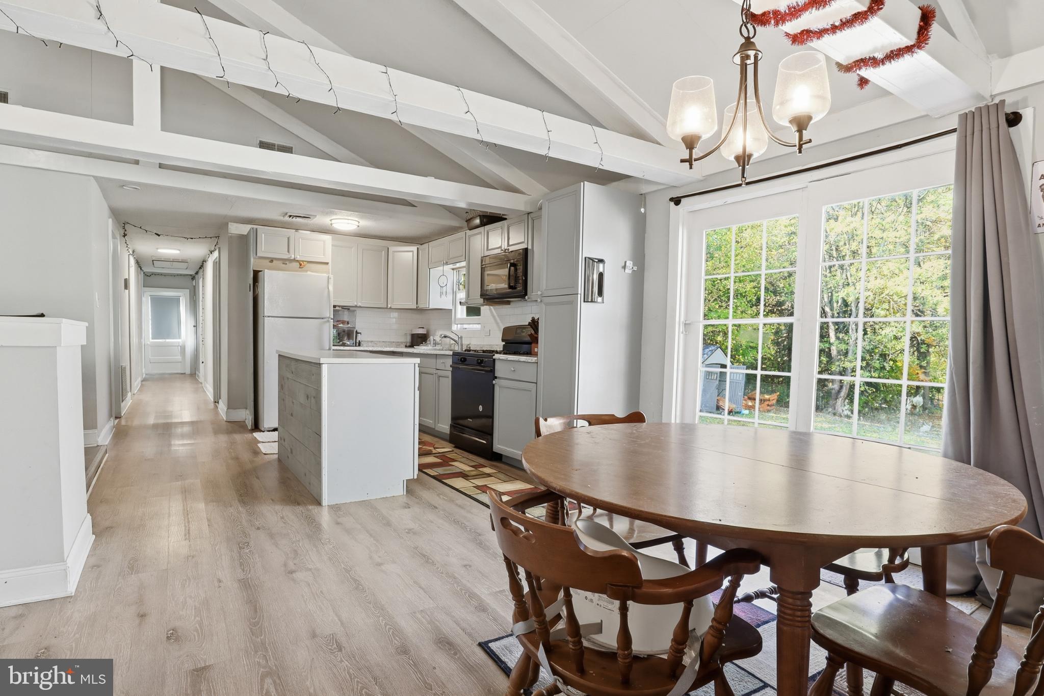 1744 Ridge Road York Springs, PA 17372 - Photo 9 of 30 a dining room with furniture and wooden floor