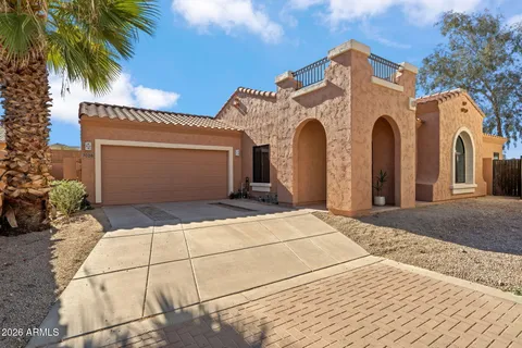 a front view of a house with a garage