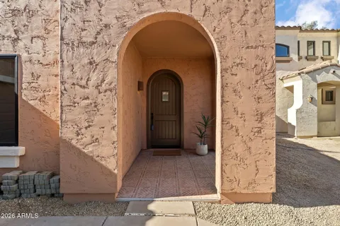 a view of a wooden door of the house