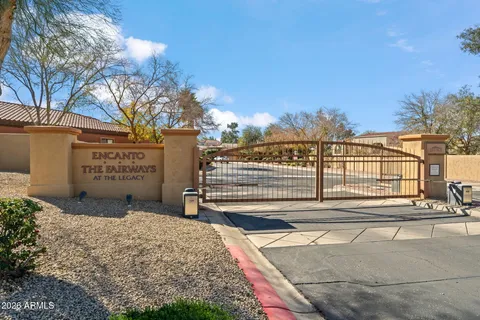 a view of a street with a building in the background