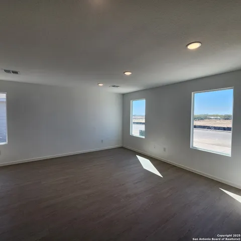 an empty room with windows