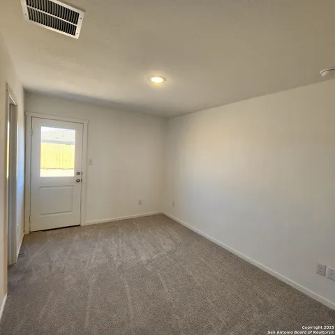 an empty room with a window